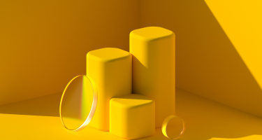 Taustakuva keltaisilla geometrisillä muodoilla